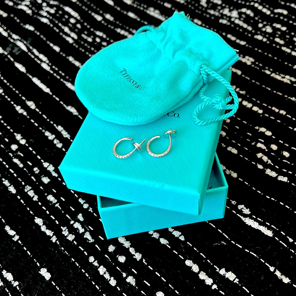 Selling never before pair of Tiffany diamond earrings